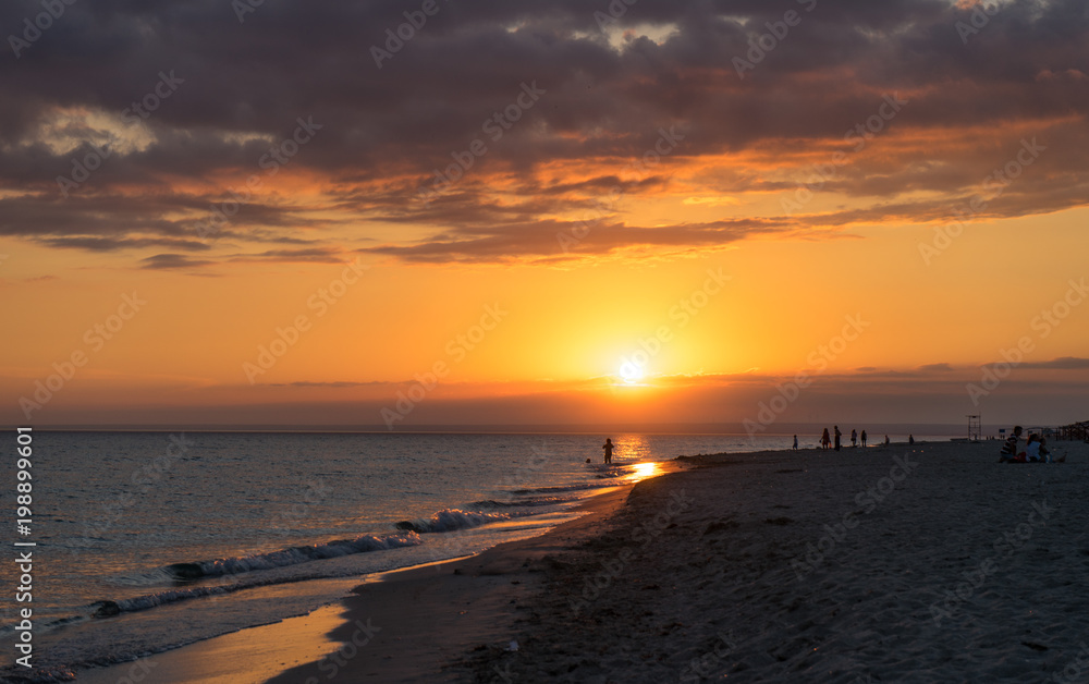 Sunset on the beach with beautiful sky in Crimea