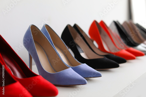 High heeled shoes on shelf in store