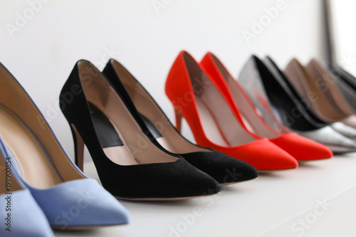 High heeled shoes on shelf in store
