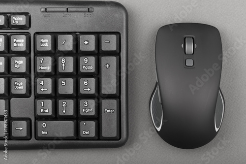 computer mouse near the keyboard