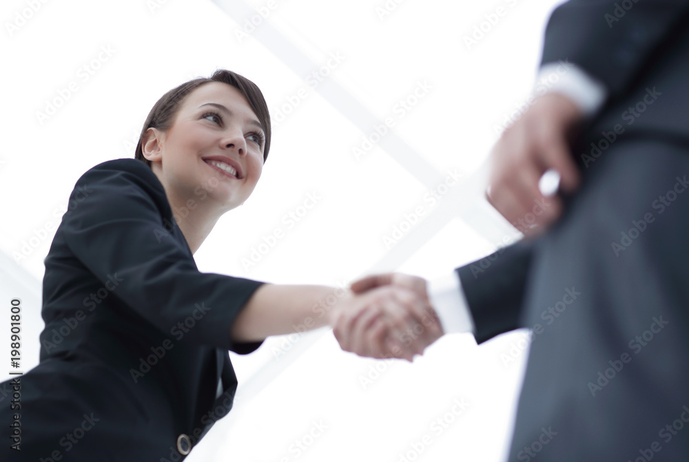 background image of business partners handshaking.close-up.