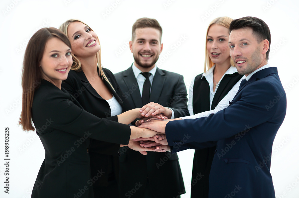 friendly business team with hands clasped together. friendly business team with hands clasped together.