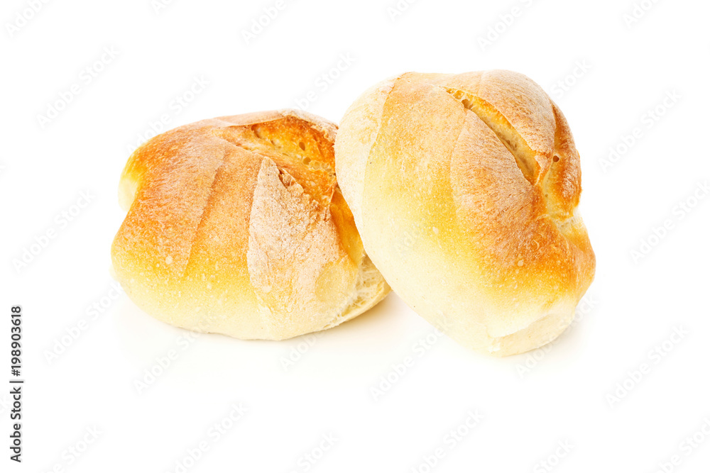 Two whole, fresh baked wheat buns