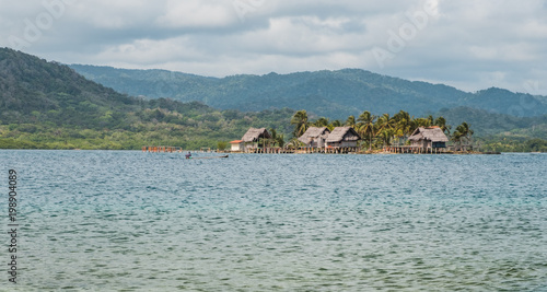 kuna village on island, wooden houses on water, Guna Yala, Panama
