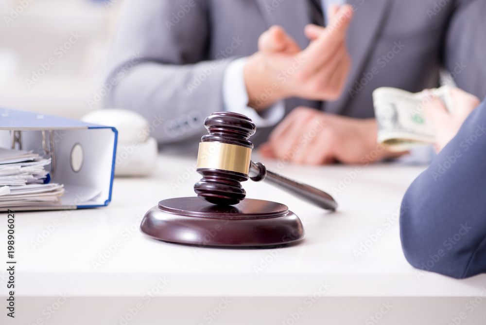 Lawyer being offered bribe for his services Lawyer being offered bribe for his services