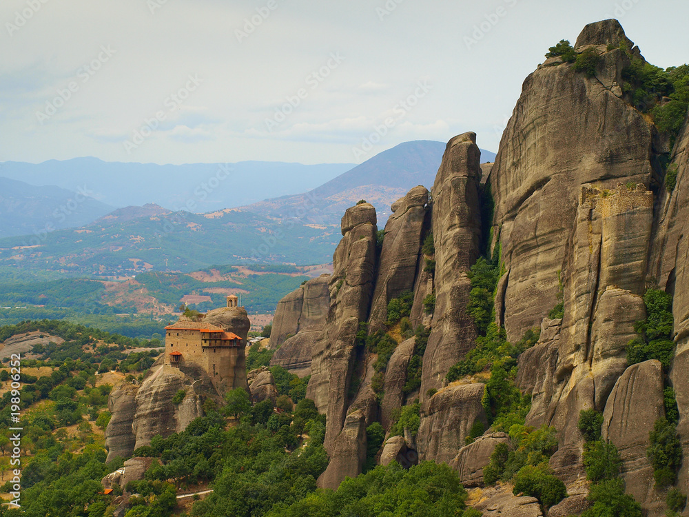 The Monastery of St. Nicholas Anapausas on the extraordinary cliffs at Meteora, Greece The Monastery of St. Nicholas Anapausas on the extraordinary cliffs at Meteora, Greece