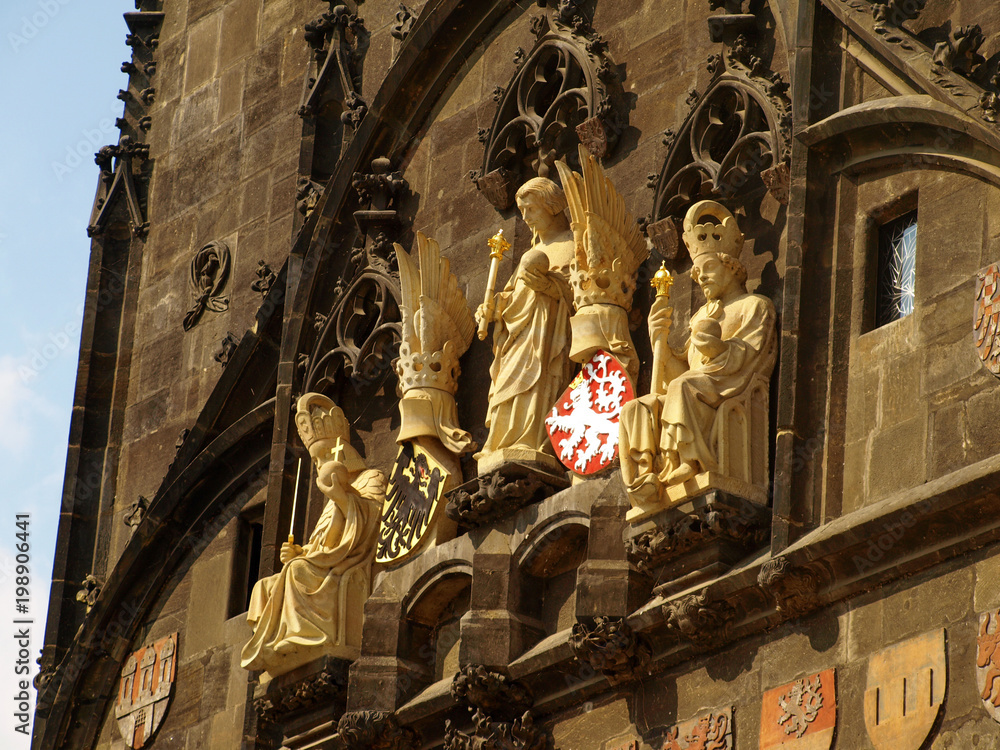 Obraz premium Statues and details of The Old Town Bridge Tower In Prague, Czech Republic