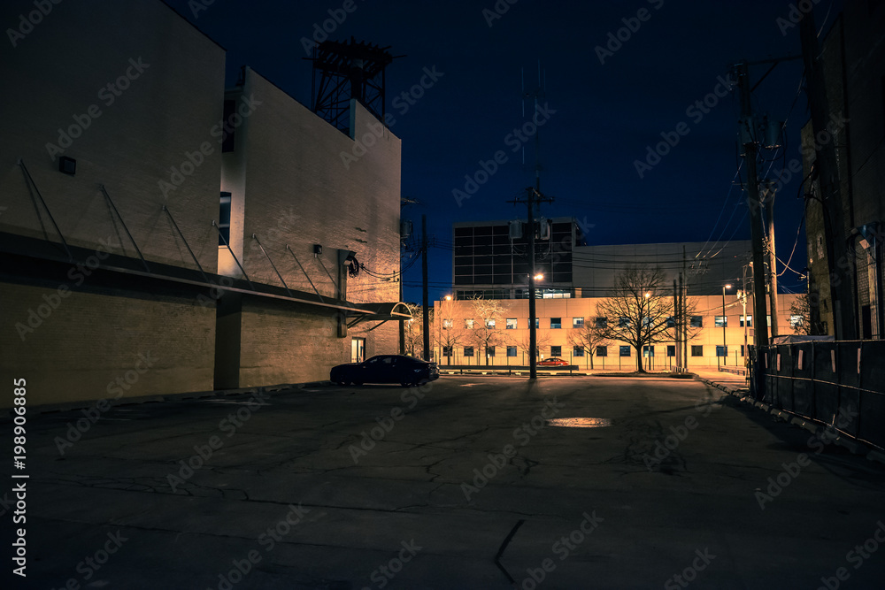 Fototapeta premium Big empty urban city parking lot at night