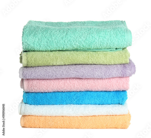 Stack of clean towels on white background. Laundry day
