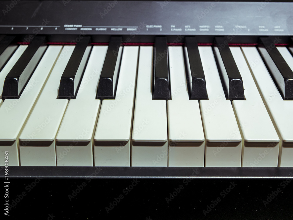Fototapeta premium close up piano keys on a classic piano