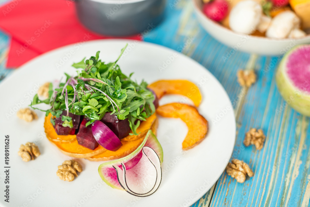 Vegetable vegetarian salad in a white plate Vegetable vegetarian salad in a white plate