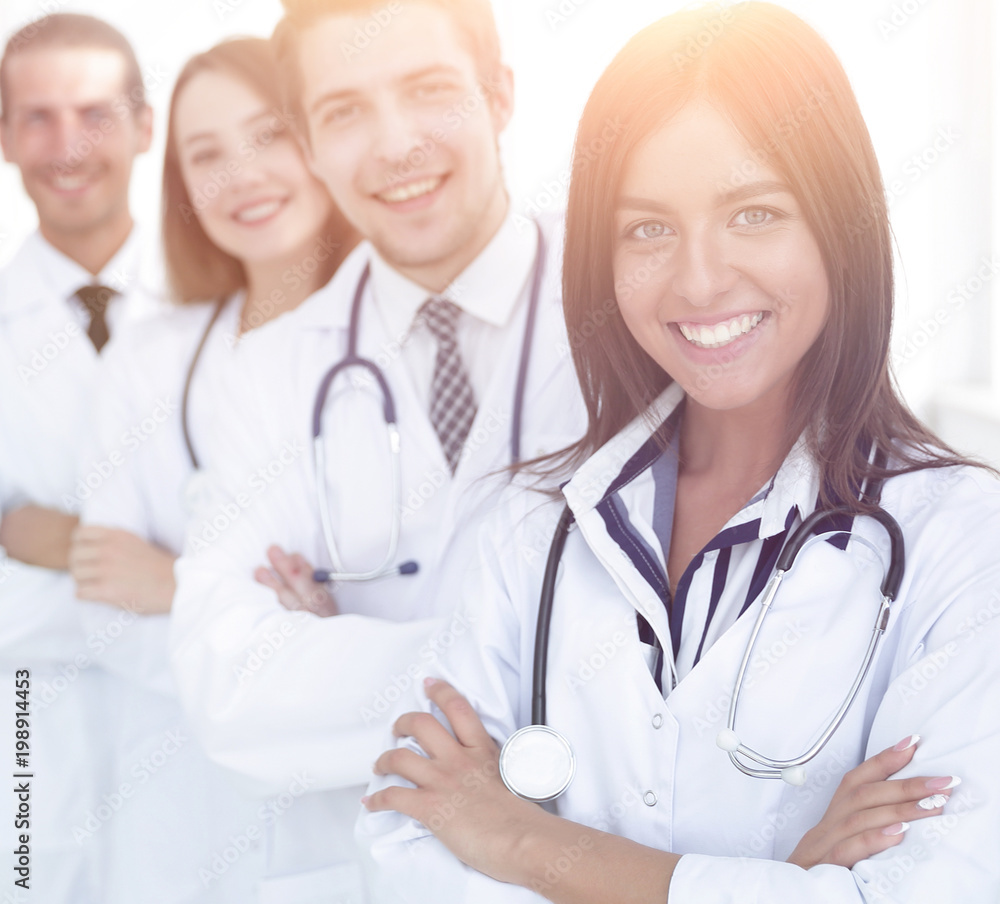 female doctor with group of happy successful colleagues female doctor with group of happy successful colleagues