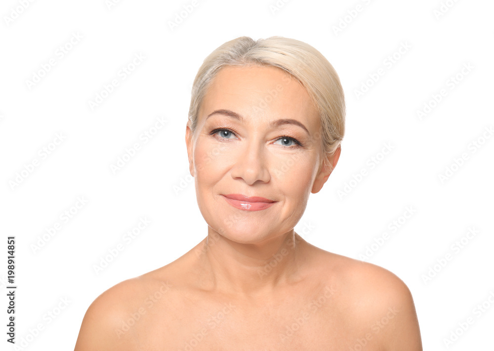 Portrait of beautiful mature woman on white background. Skin care concept Portrait of beautiful mature woman on white background. Skin care concept