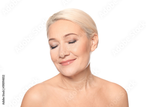 Portrait of beautiful mature woman on white background. Skin care concept