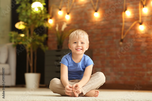 Cute little boy sitting on ...