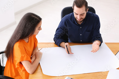 Real estate agent with clie...