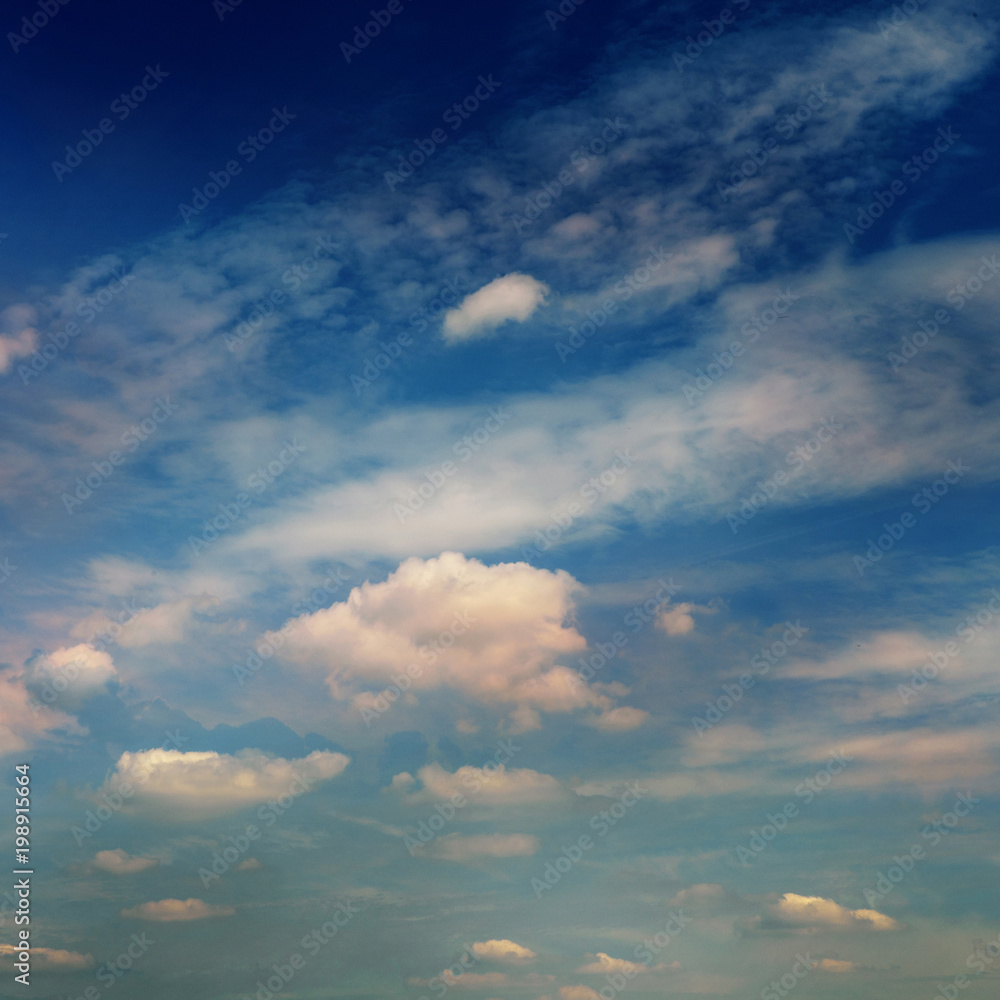 Obraz premium Background from the dramatic sky with clouds in blue tones.