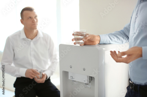 Office employees having bre...