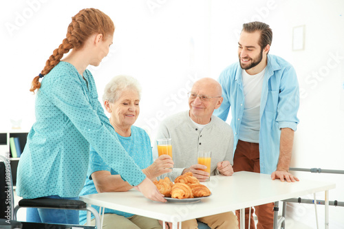 Young caregivers serving br...