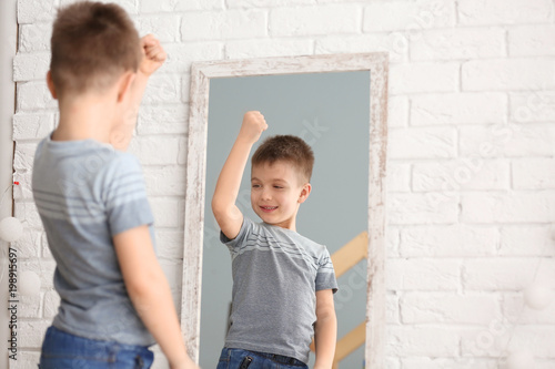 Cute little boy posing in f...