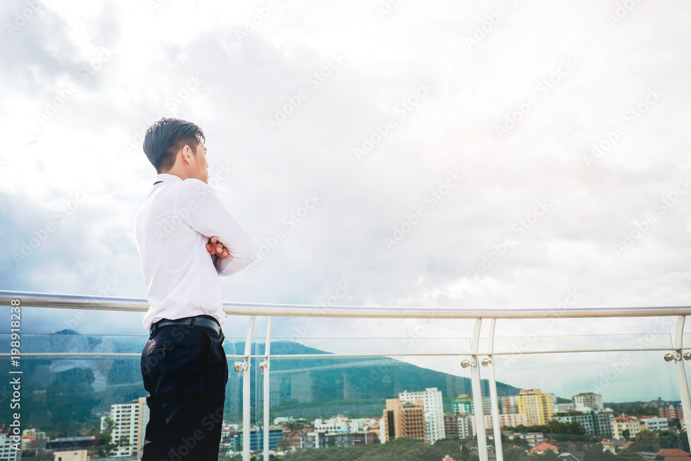 Back view of success Business man looking view the city Back view of success Business man looking view the city