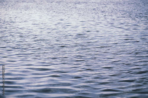 Landscape lake. Texture of water. The lake is at dawn. The mouth