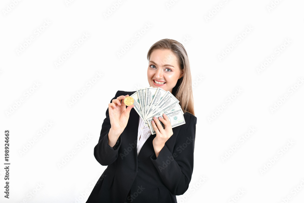 bit-coin business concept. Beautiful businesswoman is counting her money. Young business are enjoying the money and earning. Young business are happy and is saving money with the bitcoin bit-coin business concept. Beautiful businesswoman is counting her money. Young business are enjoying the money and earning. Young business are happy and is saving money with the bitcoin