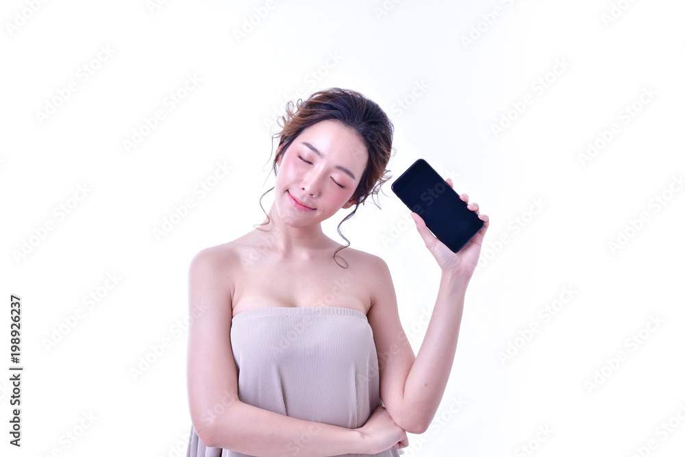 The concept of healthy beautiful woman. Beautiful women keep healthy. Beautiful woman hands holding the mobile phone. Beautiful young woman using finger pointing at mobile phone. The concept of healthy beautiful woman. Beautiful women keep healthy. Beautiful woman hands holding the mobile phone. Beautiful young woman using finger pointing at mobile phone.
