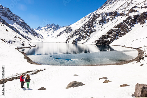 ski in chile on a sunny day with lots of snow. photo