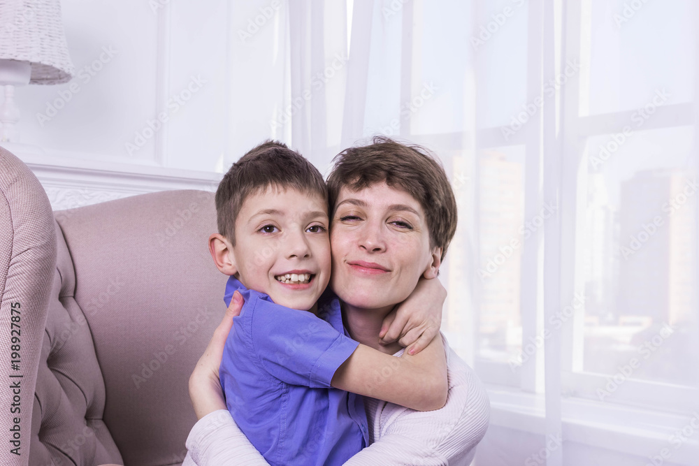 Mother's Day concept: Happy smiling mother and son Mother's Day concept: Happy smiling mother and son
