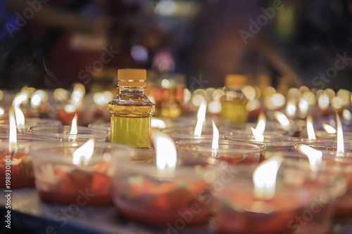 Burning candles at a Buddhist temple asian china