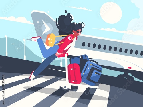 Girl carrying baggage on trolleys for flight