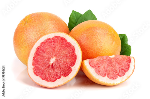 grapefruit and slices with leaves isolated on white background
