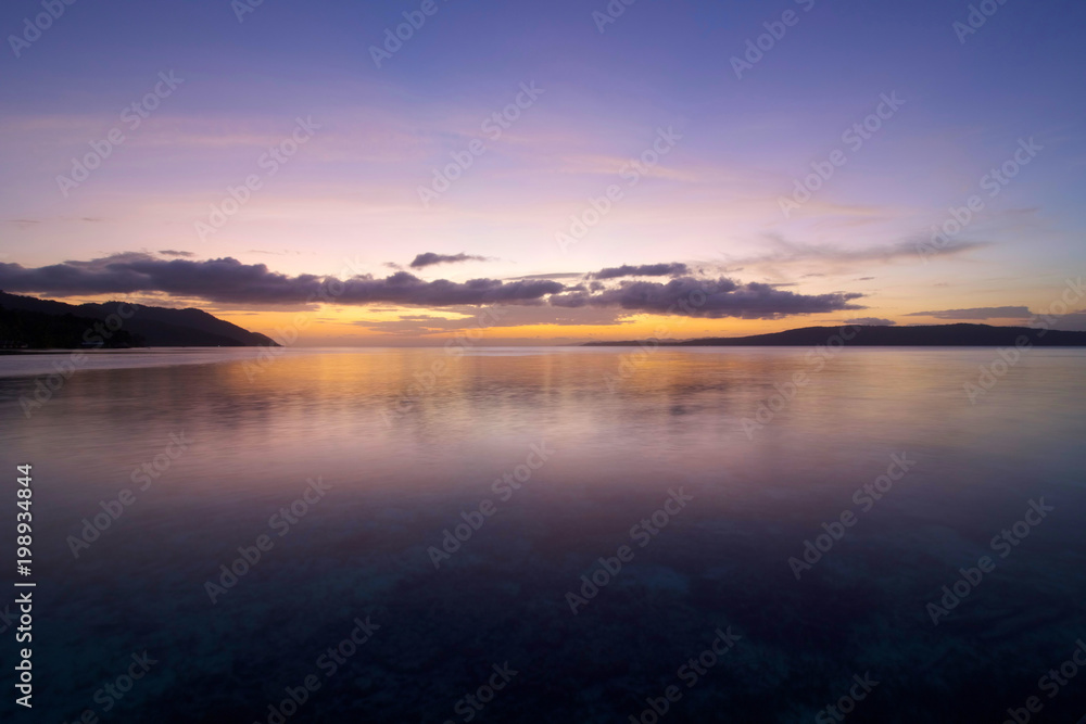 amazing sunset  on the sea  in raja ampat archipelago