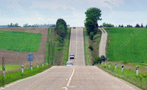 Quadro su tela long straight road in the countryside of France