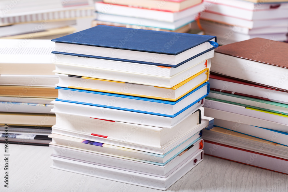 stack of various books stack of various books