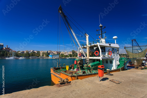 Fishing boat ancored photo