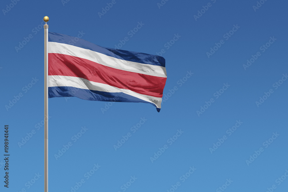 Flag of Costa Rica in front of a clear blue sky