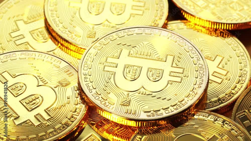 Gold coin bitcoin slowly scroll clockwise. Macro shot. 4K video.