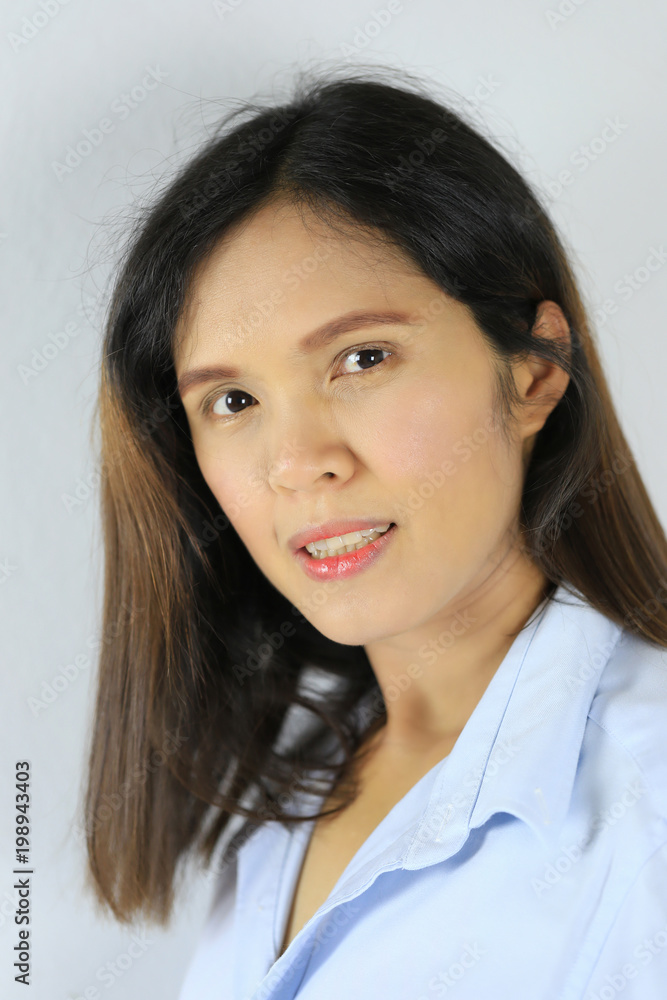 Asian woman of long hair and smiling happily. Asian woman of long hair and smiling happily.