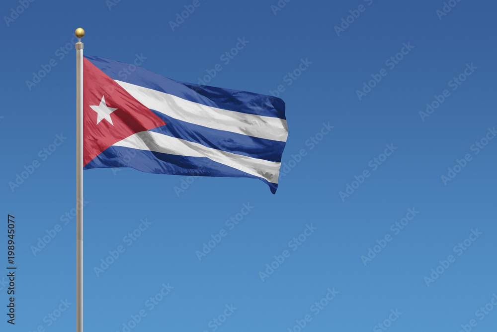 Flag of Cuba in front of a clear blue sky
