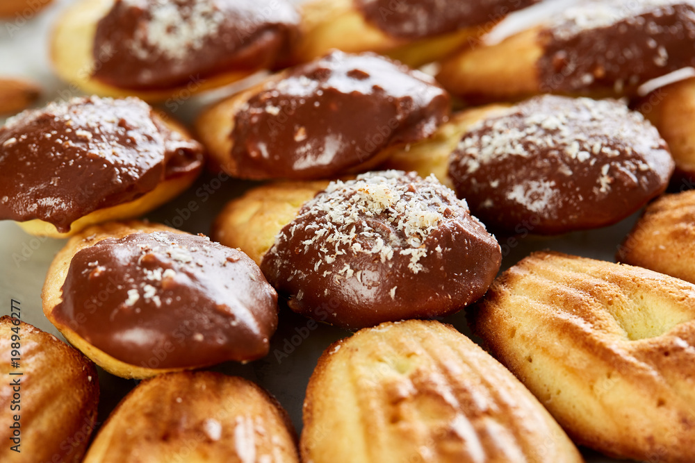 Tasty almond cookies arranged in the shape of fan on white background, close-up, selective focus Tasty almond cookies arranged in the shape of fan on white background, close-up, selective focus