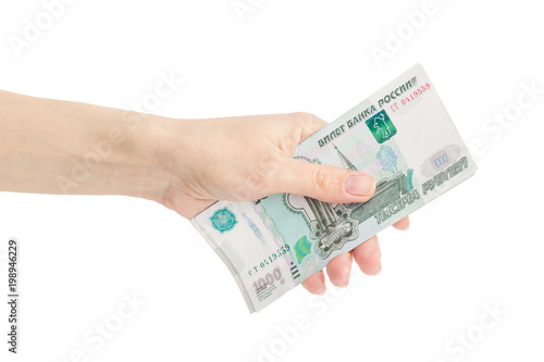 Hand with Russian rubles, isolated on white