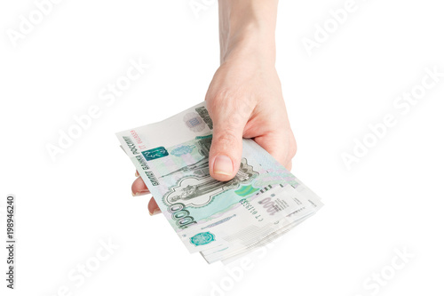 Hand with Russian rubles, isolated on white