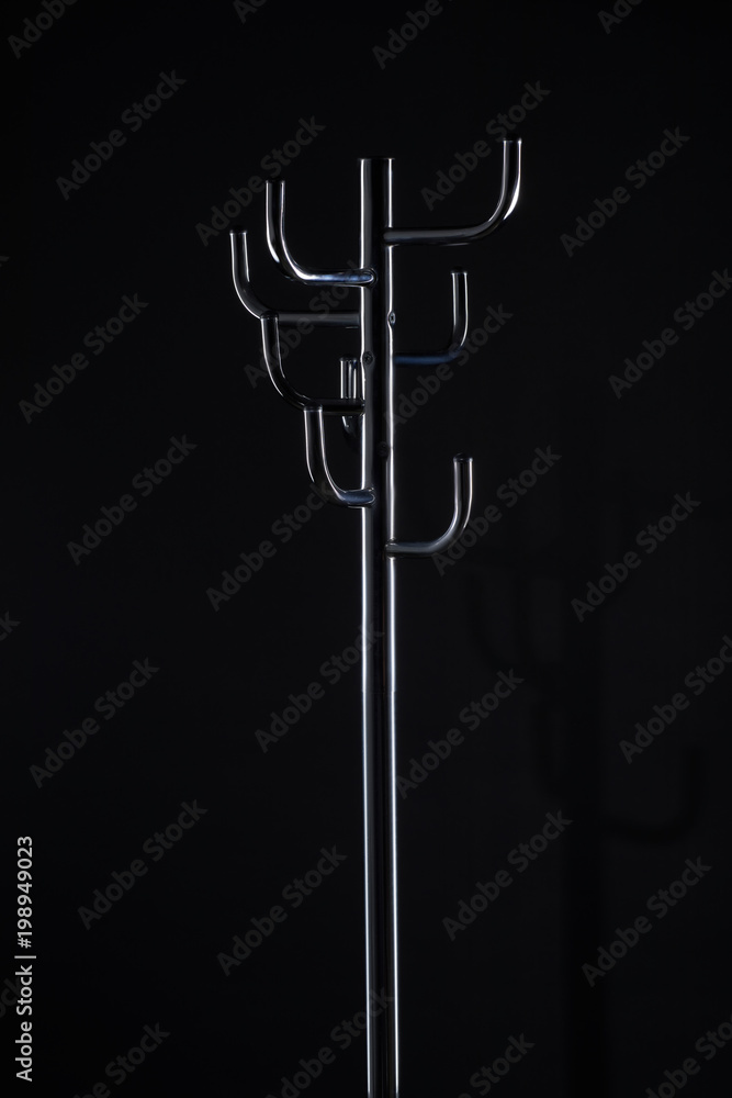 empty coat stand isolated on black empty coat stand isolated on black