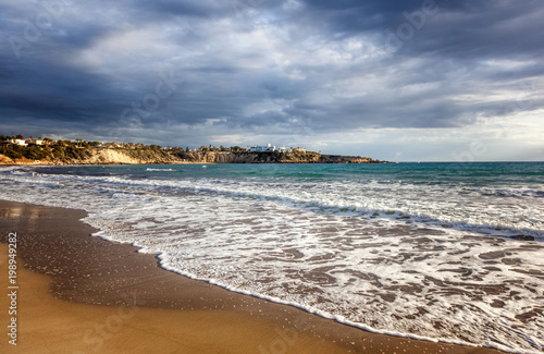 The island of Cyprus, the beach is a coral bay, in cloudy weather. Beautiful seascape