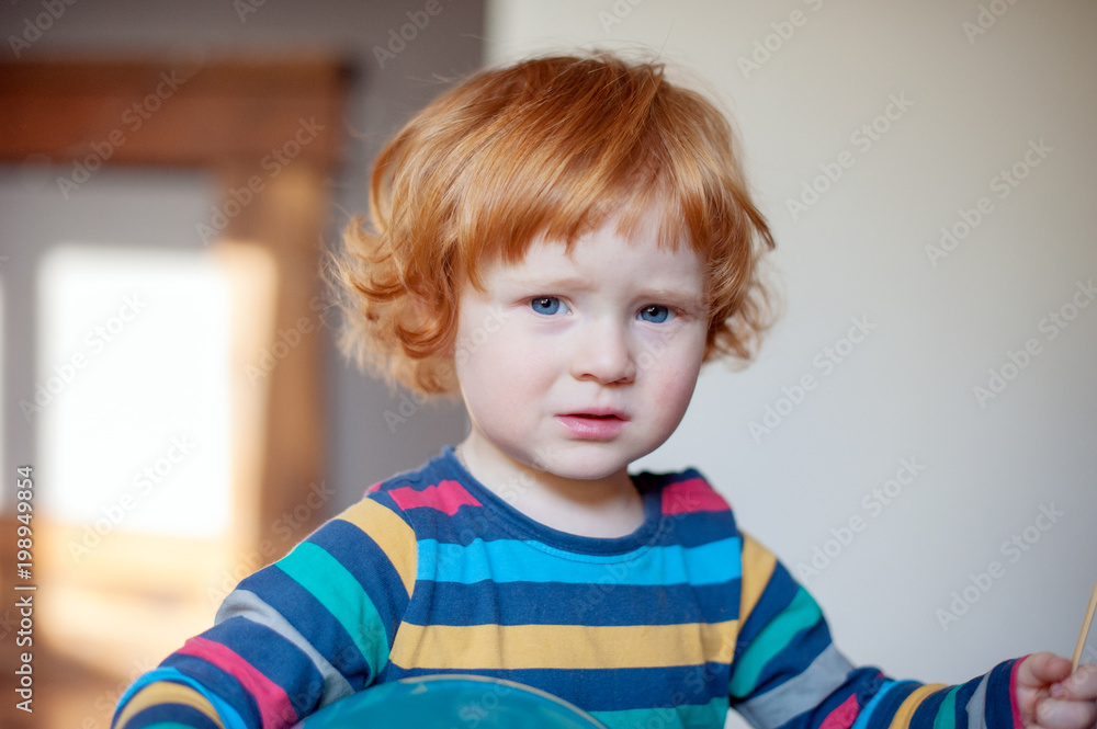 Funny dissatisfied redhead boy closeup Funny dissatisfied redhead boy closeup