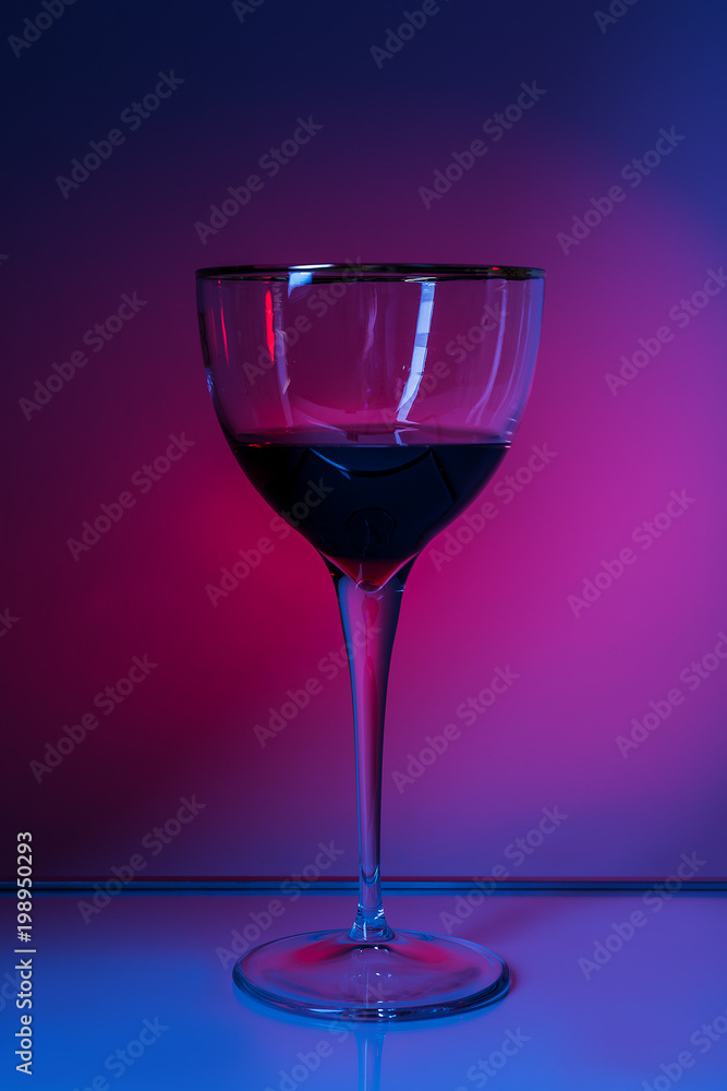 A glass of wine. A glass of wine.