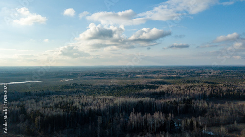 drone image. aerial view of rural area with fields and forests © Martins Vanags