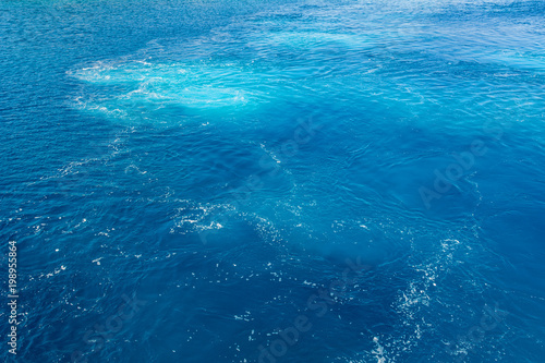 Background of blue sea water.